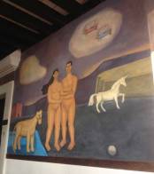 Wall paintings have depicted travel agents since the dawn of time.  (This painting just happened to adorn the walls of a law school in Mexico.)
